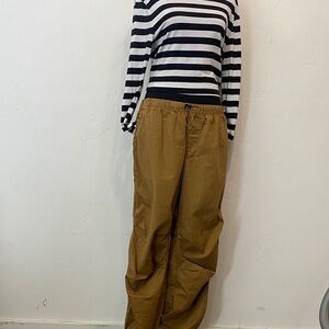 Carhartt Brown Parachute Pants with cinch waist and legs.